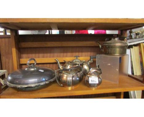 A silver plate tea set, tureen and kettle.