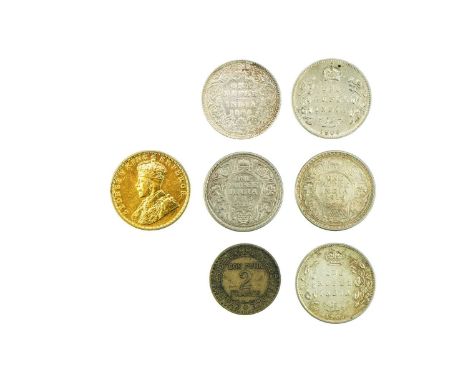 India Silver Rupees (x6) Lot comprises six silver Indian rupees: 1890, 1906 - good grade, 1907 - good grade, 1917 - gilded, 1