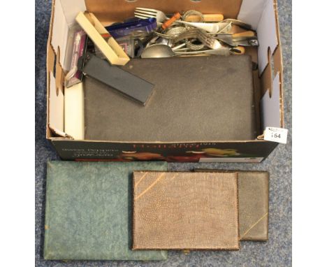 Box of assorted loose and cased cutlery, to include: teaspoons; apostle teaspoons; fish knife and fork set; assorted napkin r