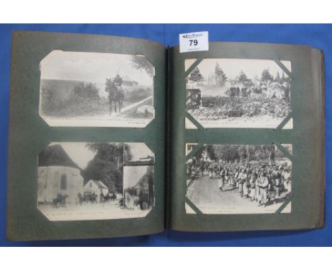 Red album of postcards mostly European with military interest, First World War devastation of France and Belgium, standing so