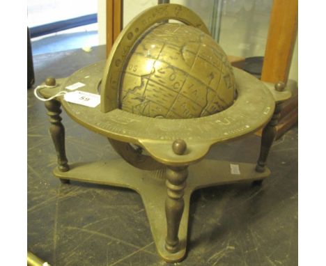 Reproduction brass table globe on stand.(B.P. 24% incl. VAT)