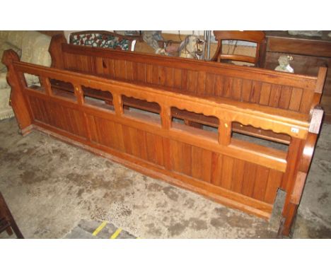 Late 19th/early 20th Century pitch pine church pew together with a pitch pine church front stand/book trough. (2)(B.P. 24% in