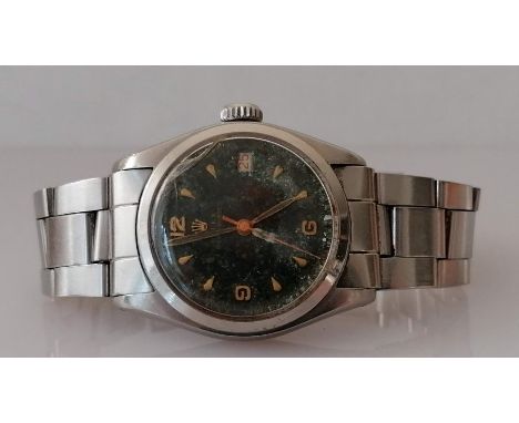 A Rolex Oysterdate Precision stainless steel wristwatch, ref. 6066, circa 1953, serial no. 7087xx, black dial with Arabic qua