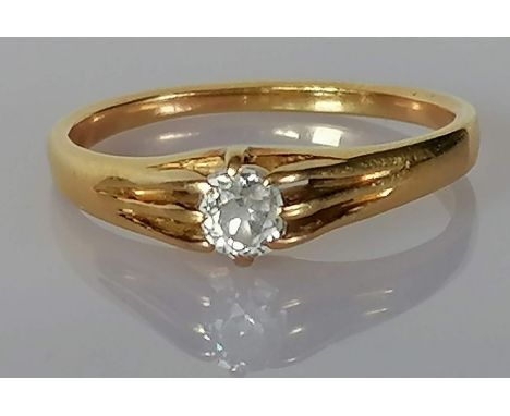 A late Victorian diamond ring with an old mine-cut diamond, weighing a calculated 0.40 carat, estimated colour/clarity K/L, S