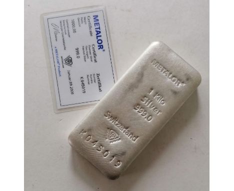 A Metalor 1kg 999.0 silver bar/ingot with certificate, number K 045019 