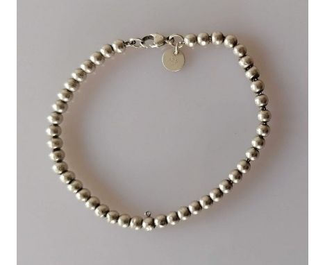 A Tiffany &amp; Co., silver bead bracelet, stamped 925, light wear from ordinary use