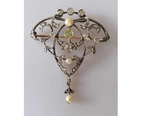 A Victorian peridot, diamond and pearl pendant brooch on a rose gold frame, 65mm x 55mm, the peridot 0.20 carats, the pearls 