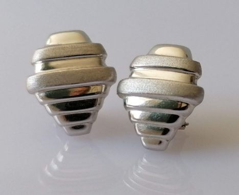 A pair of vintage white gold clip earrings with stylised, textured design, stamped 740 Errip, 5.8g