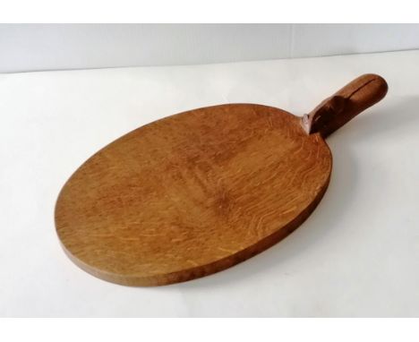 A Robert Thompson of Kilburn 'Mouseman' oak cheeseboard, 39cm W, including handle, in good condition