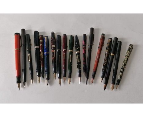 An assortment of eighteen vintage fountain pens to include Waterman's, Parker, Stephens, Swan, etc, most with 14k gold nibs (