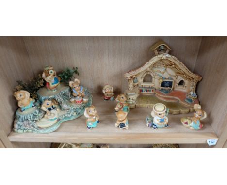 A collection of Pendelfin Characters to include Old School House and Tree trunk Display pieces and 10 figures  (12)