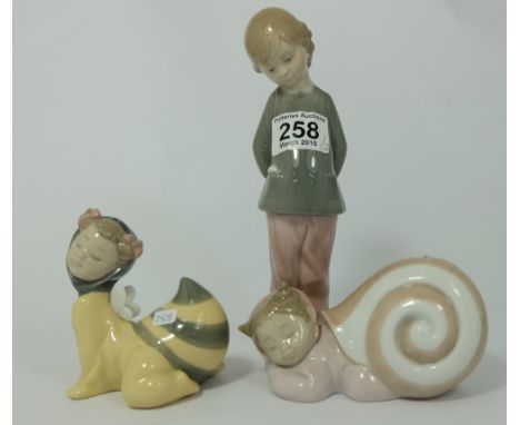 Nao children figures comprising boy standing with ball, Snail girl and Bumble bee boy, 2 boxed (3) 
