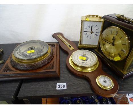 A reproduction balloon barometer, table top barometer, carriages clock and a mantle clock