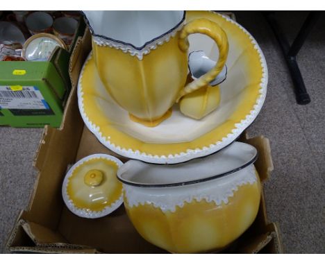 A Staffordshire canary yellow coloured wash basin set