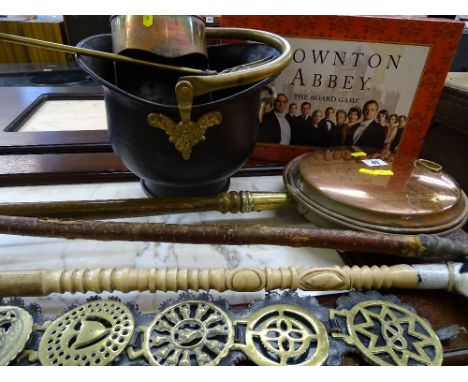 Brass bed pan, coal scuttle, horse brasses, walking stick and one other with a dog head handle, etc