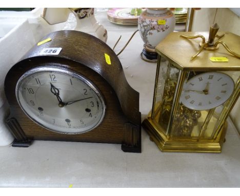 A boule, brass effect mantel clock and polished mantel closk
