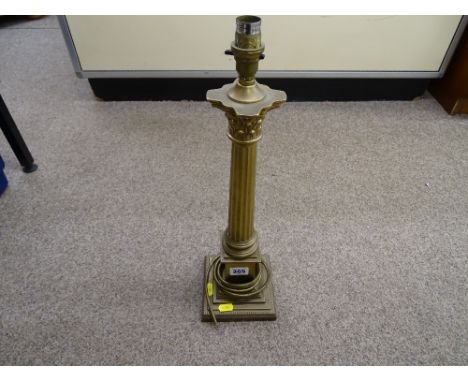 A brass corinthian column table lamp