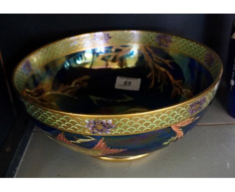 An unusual Maling lustre pedestal bowl, decorated with fish inside gilt borders and foliate, 24cm diameter. CONDITION REPORT: