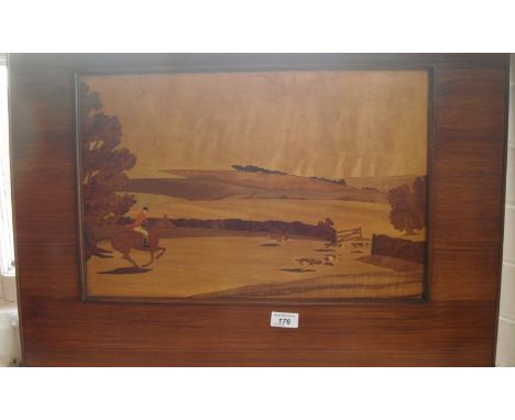 A vintage inlaid wooden panel depicting a hunting scene.