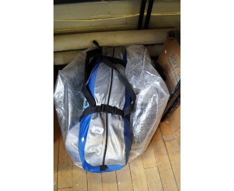 A three man tent with pump and lamp.