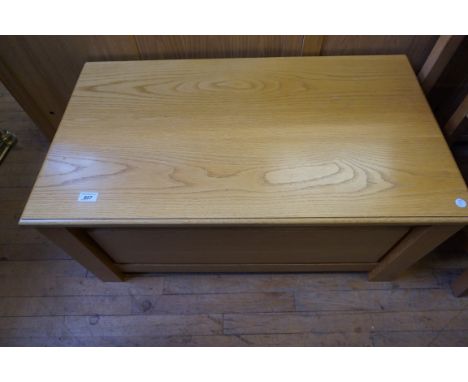A good quality reproduction light oak finished blanket chest.