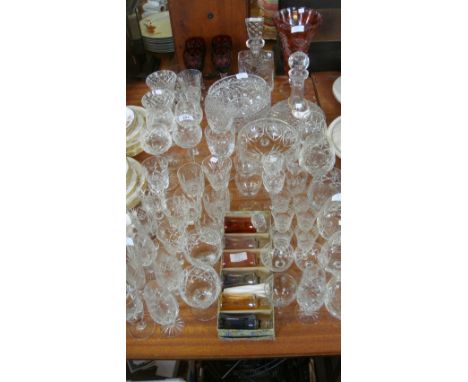 A large quantity of assorted good quality and further glassware, to include Bohemian ruby vase, decanters, wine glasses etc.