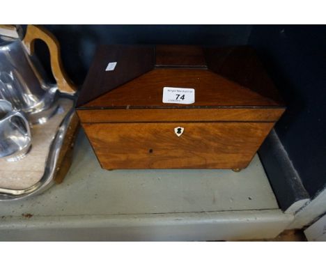 A Victorian Georgian style mahogany tea caddy of rectangular form.