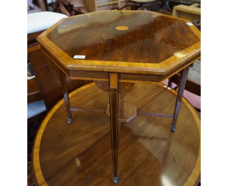 An Edwardian inlaid rosewood octagonal topped occasional table. CONDITION REPORT: Lot 544
Central split to top also further s