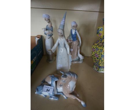 Two Lladro figures to include a Wizard, a further Nao figurine and a Franklin Mint figure Tenderness.