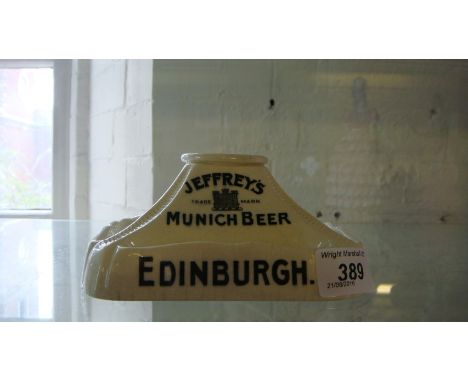 A Jeffery's unique beer of Edinburgh advertising match striker. CONDITION REPORT: Crazing to body, internal manufacturing cra