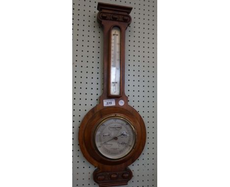 A contemporary hardwood banjo barometer.