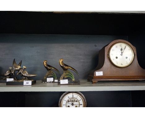 Two pairs of Art Deco bookends to include a pair modelled in the form of pheasants, also an early 20th Century mantel clock.