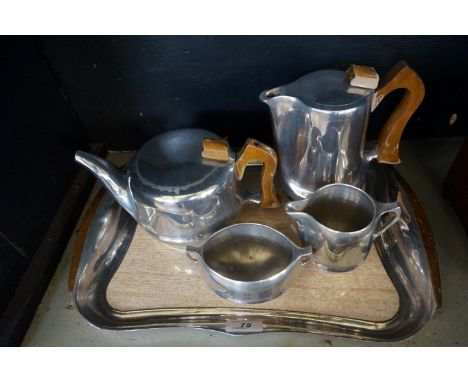 A vintage Piquot ware five piece tea service.