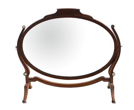 Oval mahogany dressing table mirror on splay supports, inset with ivorine roundels, W76 x D28.5 x H65cms