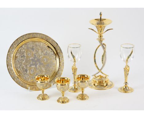 Russian gilt metal and jewelled candlestick and snuffer, 20th Century, set with semi-precious stones, 23cm high, together wit