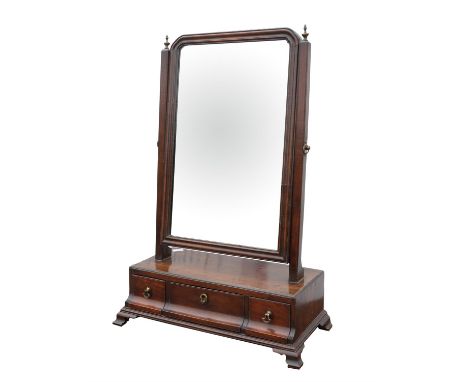 Mahogany toilet mirror, 18th/early 19th Century, with rectangular plate supported by plain uprights with urn finials, the bas