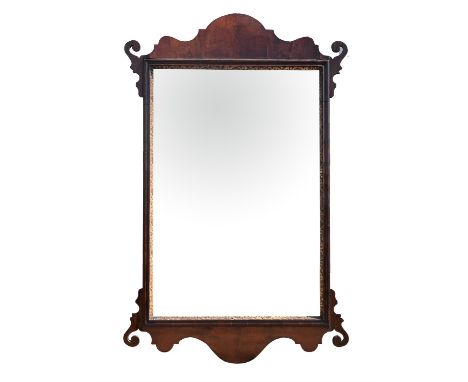 George I style mahogany mirror, with an arched cresting and apron, with scroll members to the corners, with gilt inset slip, 