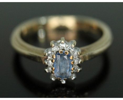 A 9ct gold sapphire and diamond cluster ring, the cluster measuring approx. 8.49mm x 6.57mm, hallmarked 9ct gold, sponsor's m