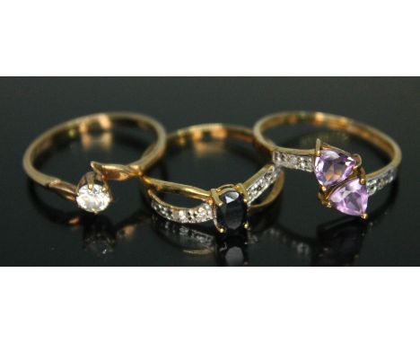 A hallmarked 9ct gold ring and two others marked '375', various settings, gross wt. 3.64g, sizes M, O &amp; P (pictured left 