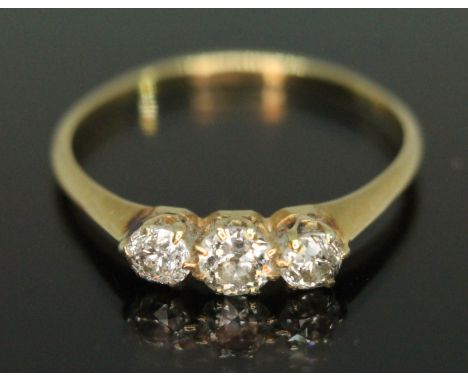 An early 20th century three stone diamond ring, the Old European cut stones weighing approx. 0.17, 0.18 &amp; 0.24 carats, ba