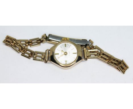 A 1960s hallmarked 9ct gold Regency 17 jewel manual wind ladies wristwatch on rolled gold strap with original box and papers,