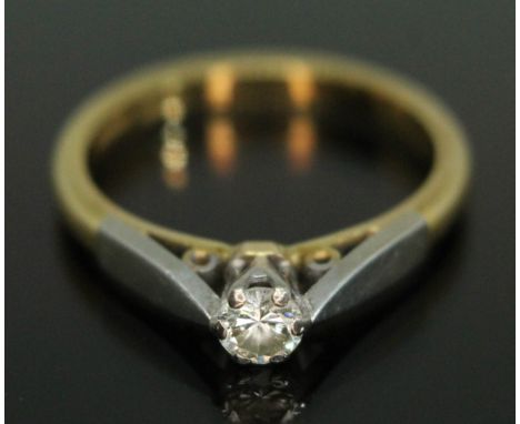 A hallmarked 18ct gold diamond solitaire ring, the modern round brilliant cut stone weighing approx. 0.17 carats, gross wt. 3