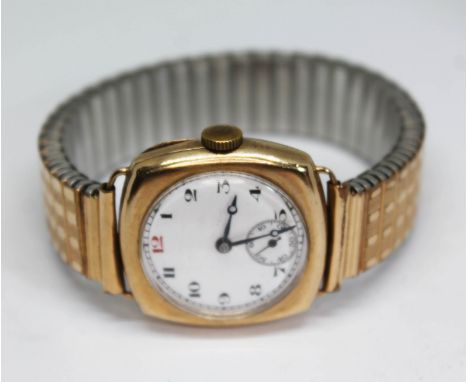 An early 20th century 9ct gold manual wind wristwatch having unsigned white enamel dial with Arabic numerals, Breguet hands a