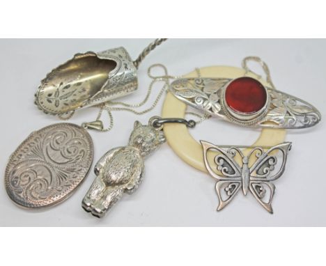 A mixed lot comprising a hallmarked silver teddy bear teething ring, a Scottish hallmarked silver butterfly brooch, a hallmar