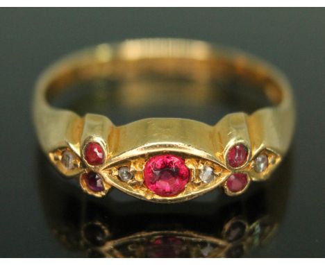 An 18ct gold red paste and diamond ring, sponsor's mark 'T&amp;AH', Birmingham 1942, gross wt. 2.23g, size O.  