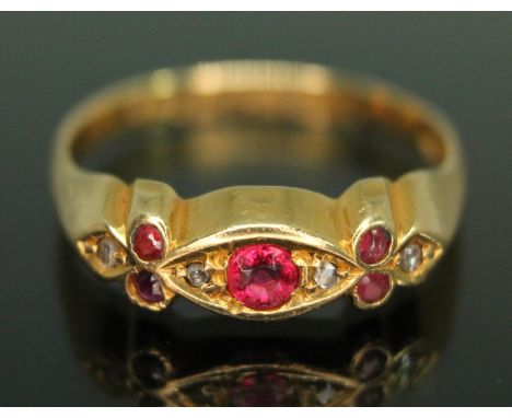 An 18ct gold red paste and diamond ring, sponsor's mark 'T&amp;AH', Birmingham 1942, gross wt. 2.23g, size O.  