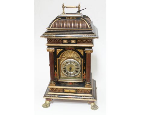 A Junghans polyphon mantle clock, Chinoiserie decorated case, raised on four claw feet, height 56cm.  