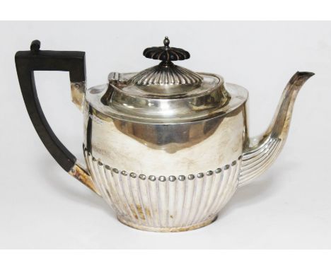 A George V silver teapot, Walker &amp; Hall, Sheffield 1916, length 26cm, wt. 18oz.  