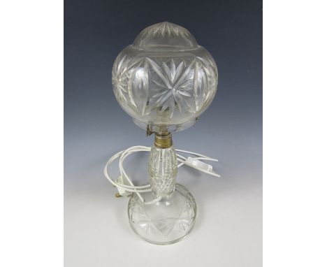 A cut glass table lamp with conforming shade, second quarter 20th Century