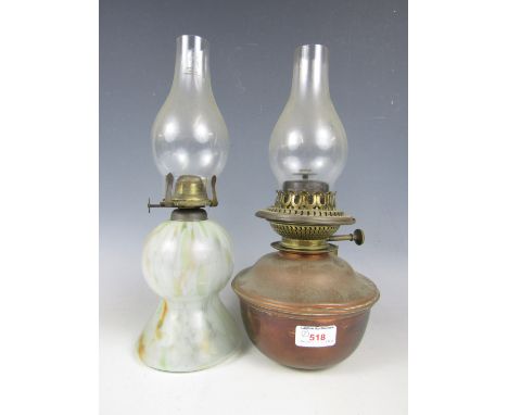 A brass oil lamp and a glass oil lamp